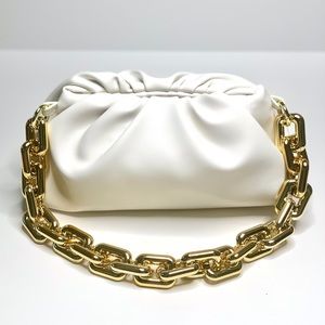 Gold chain faux leather shoulder bag.